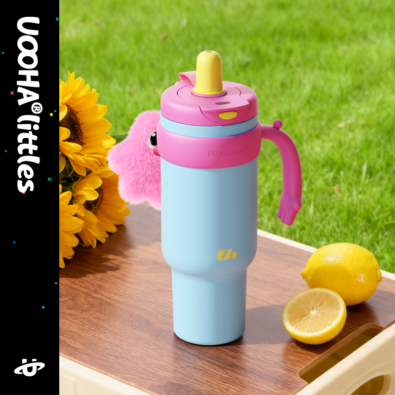 Colorful Uooha handled cup styled with citrus on a sunny desk